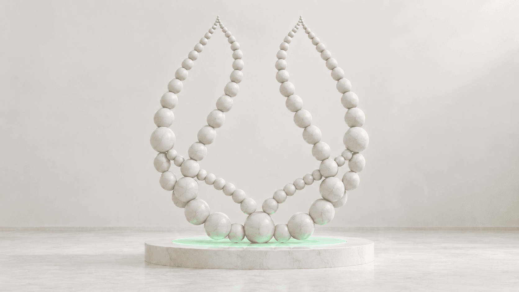 A Catch mark sculpted from pale marble spheres, above a circular plinth with a fine mint-green seam.